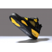 Кроссовки Nike Air Jordan 4 черные с желтым 